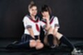 Scott kristen seated with mary wearing uniforms